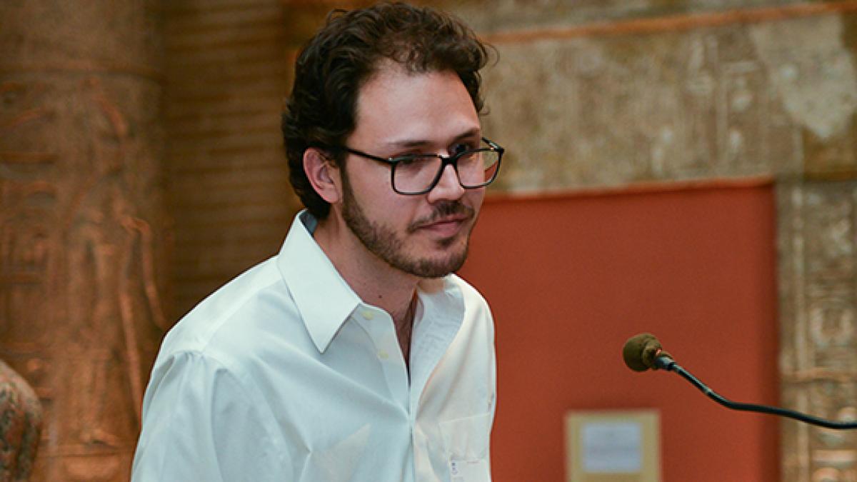Graduate Student Diego Amador Osuna accepts the Edwin Mansfield Teaching Prize.
