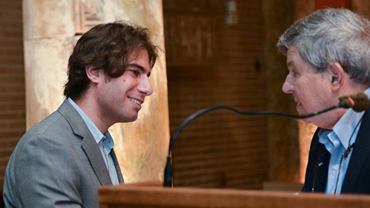 Felipe Saffie (left) received the Joel Popkin Graduate Student Teaching Prize in Economics from Joel Popkin (right).